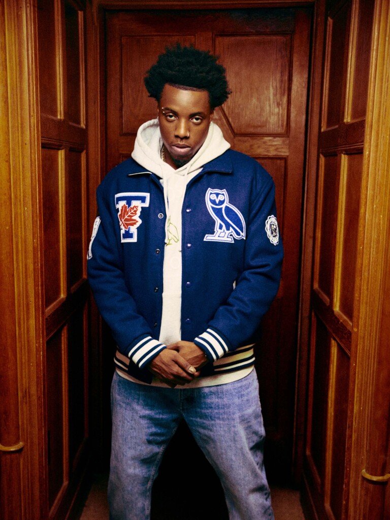 Musician Roy Woods modelling U of T OVO Varsity Jacket Fall 24