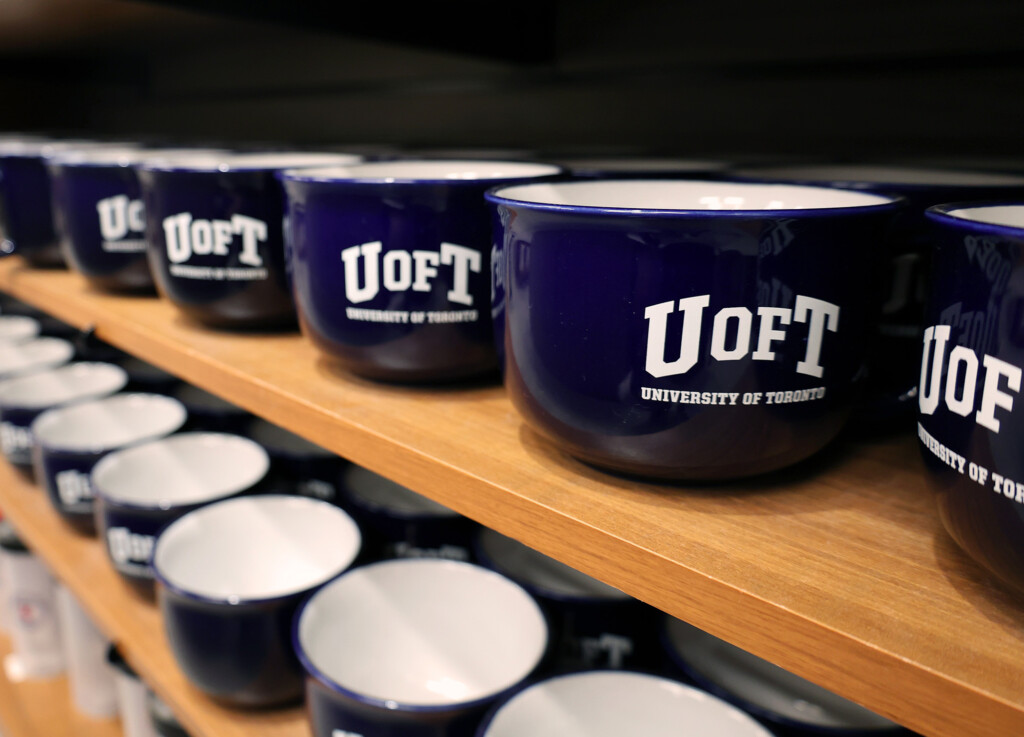 Row of navy blue U of T soup mugs